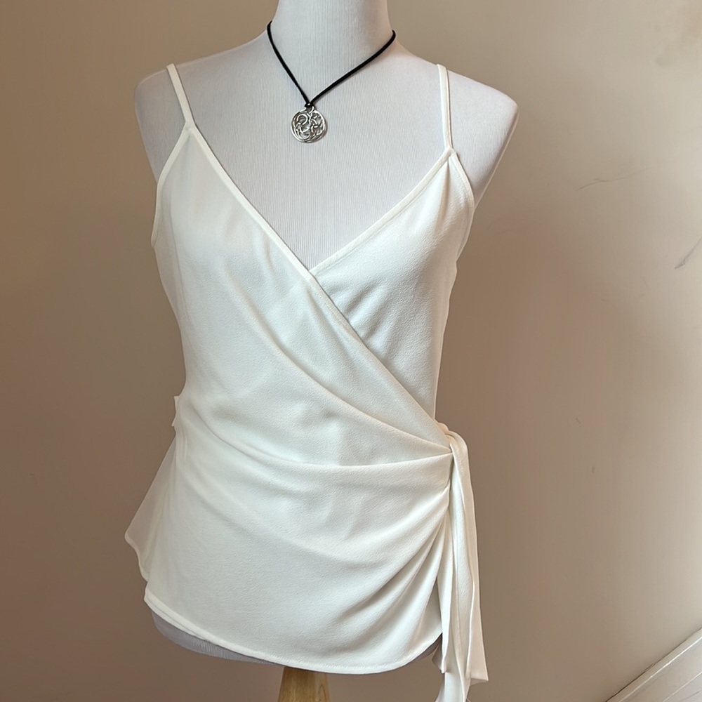 White sleeveless wrap blouse 1.State Size Medium